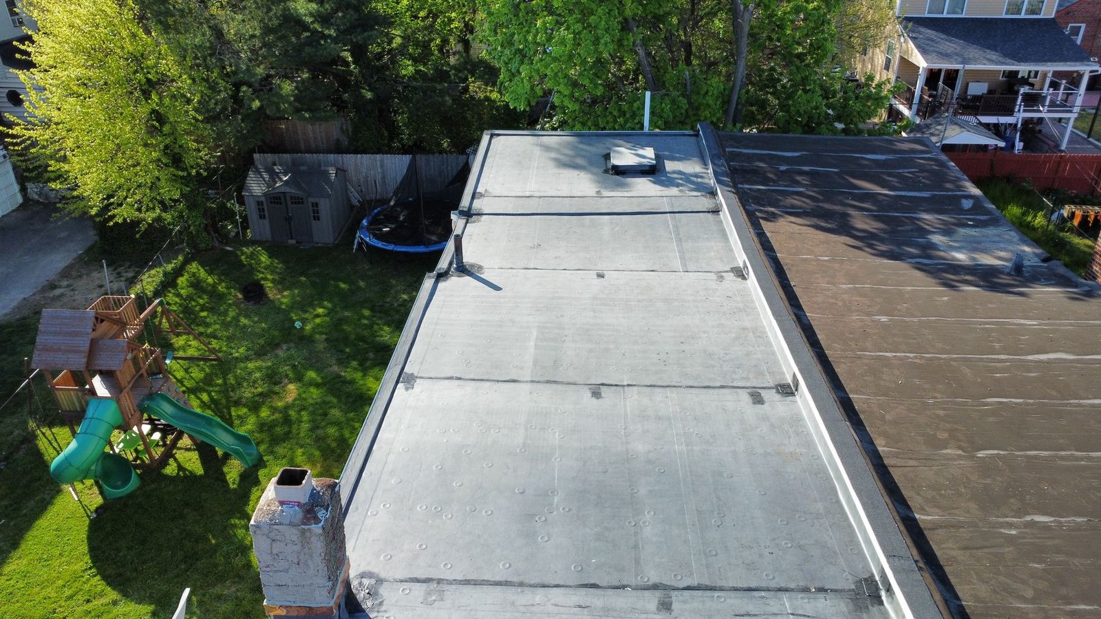 After — additional rear angle showing completed EPDM flat roof — Shelby Roofing Services PA