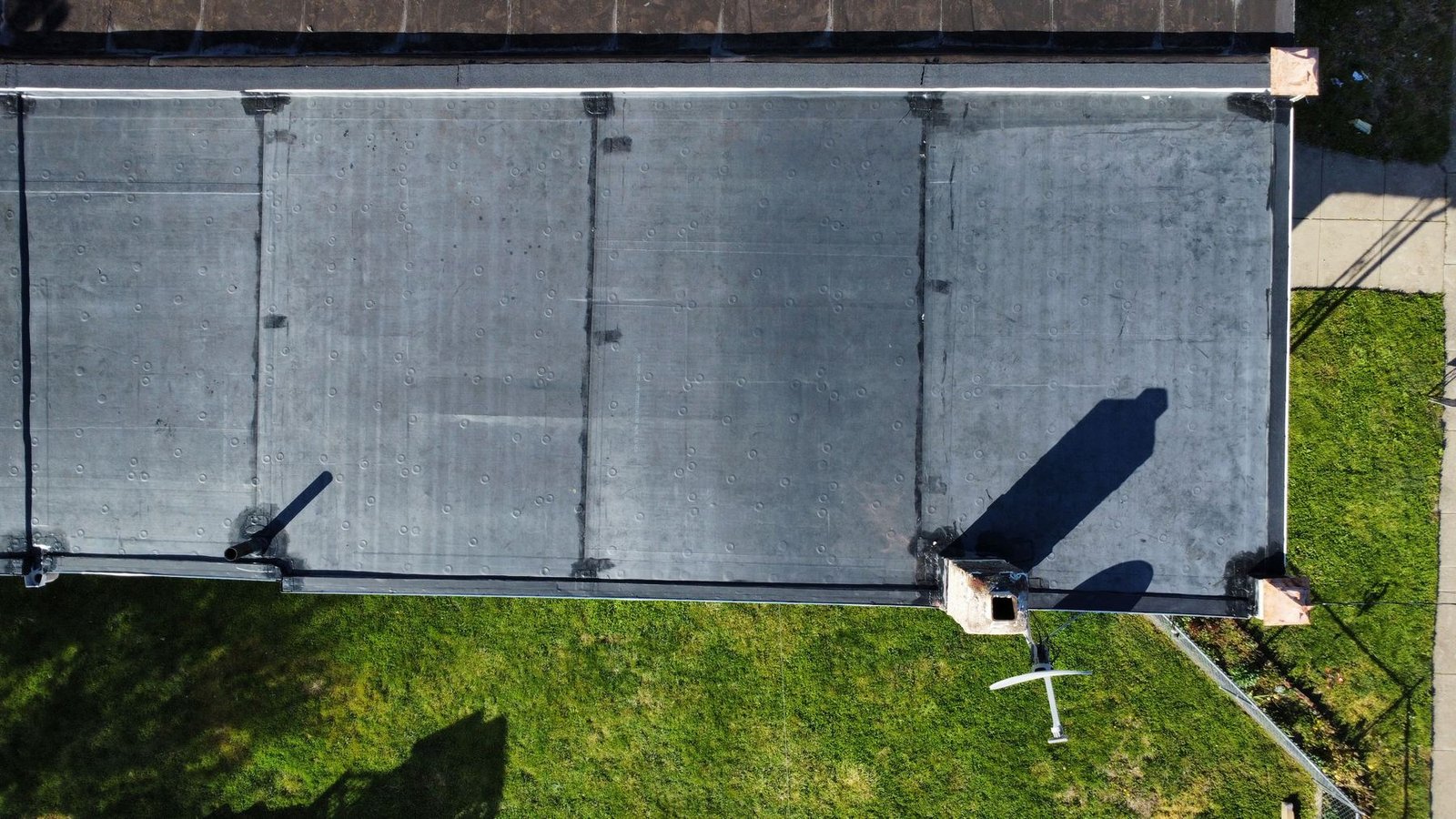 After — top-down view of completed EPDM flat roof system — Shelby Roofing Services PA