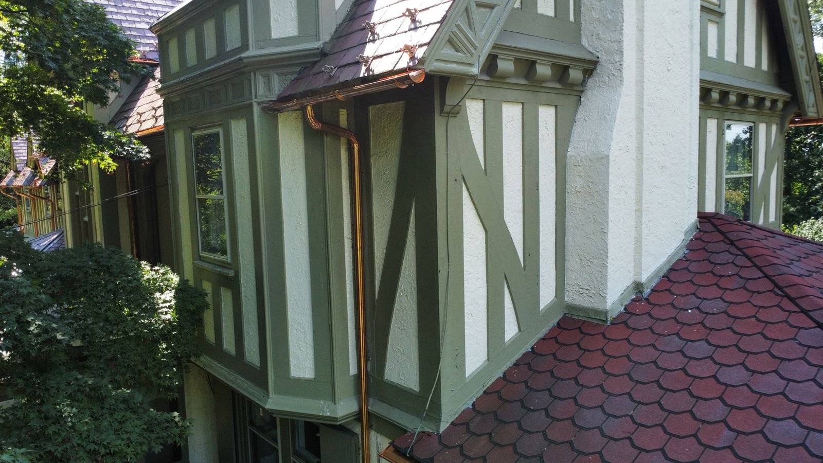After — bay window tower section with new copper downspout installed — Shelby Roofing Services PA