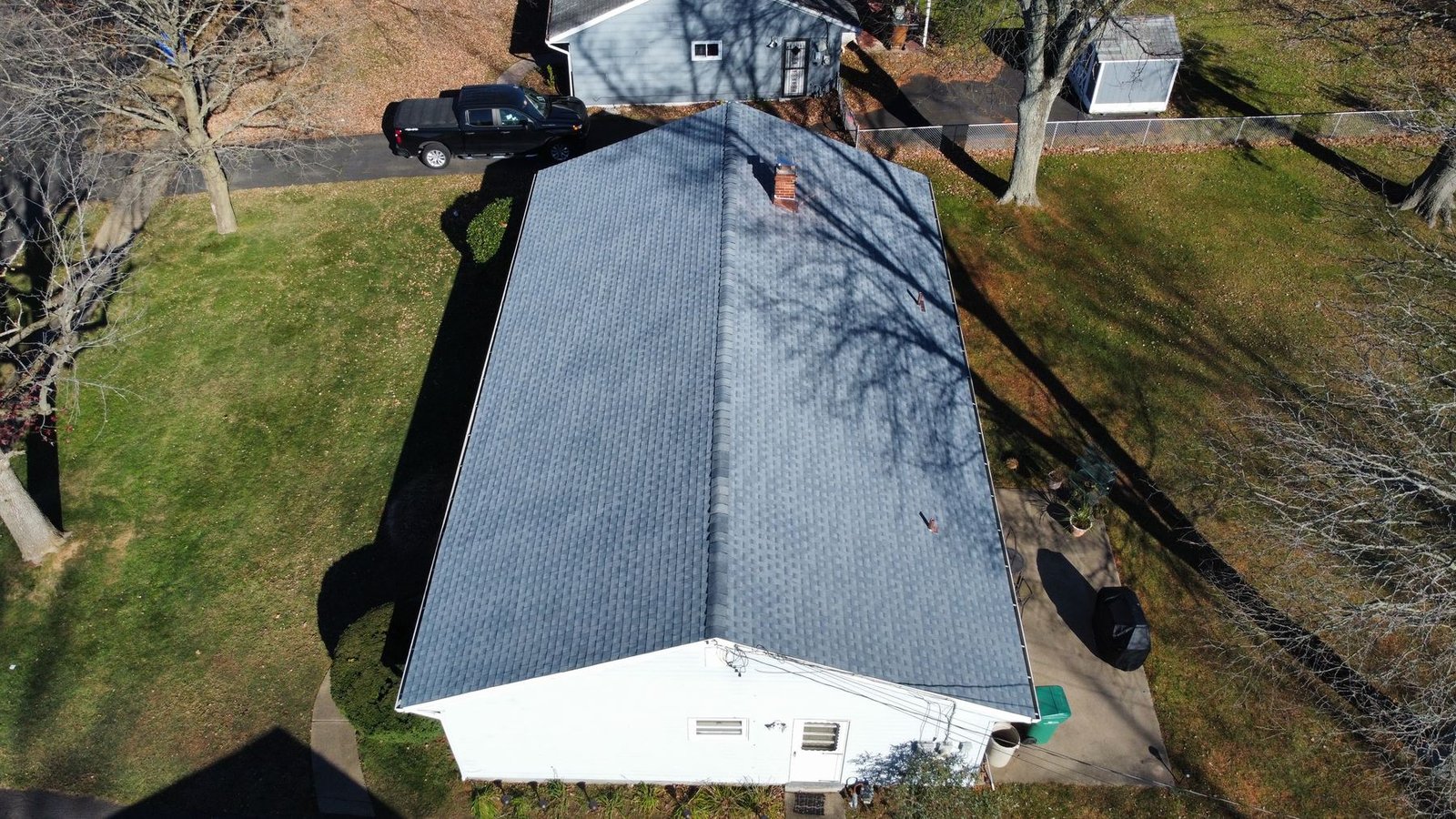 After — top-down drone view of completed ranch home shingle replacement — Shelby Roofing Services PA