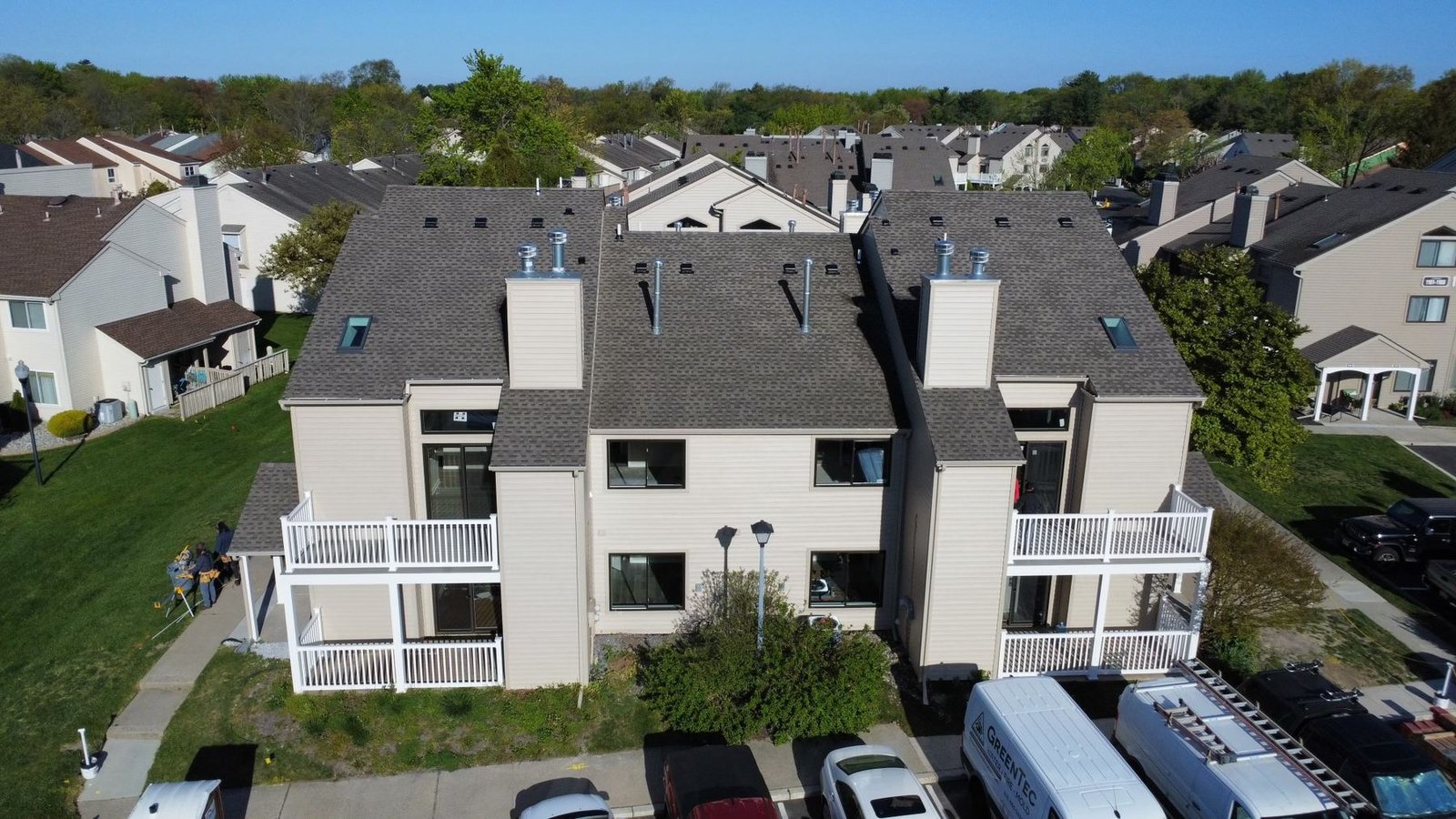 After — wide aerial of completed condo complex — Shelby Roofing Services PA