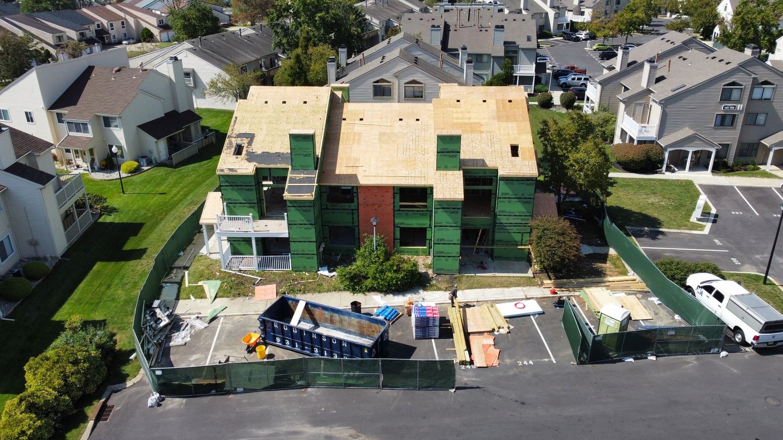 In-progress — full tear-off and new OSB decking on condo complex, PA