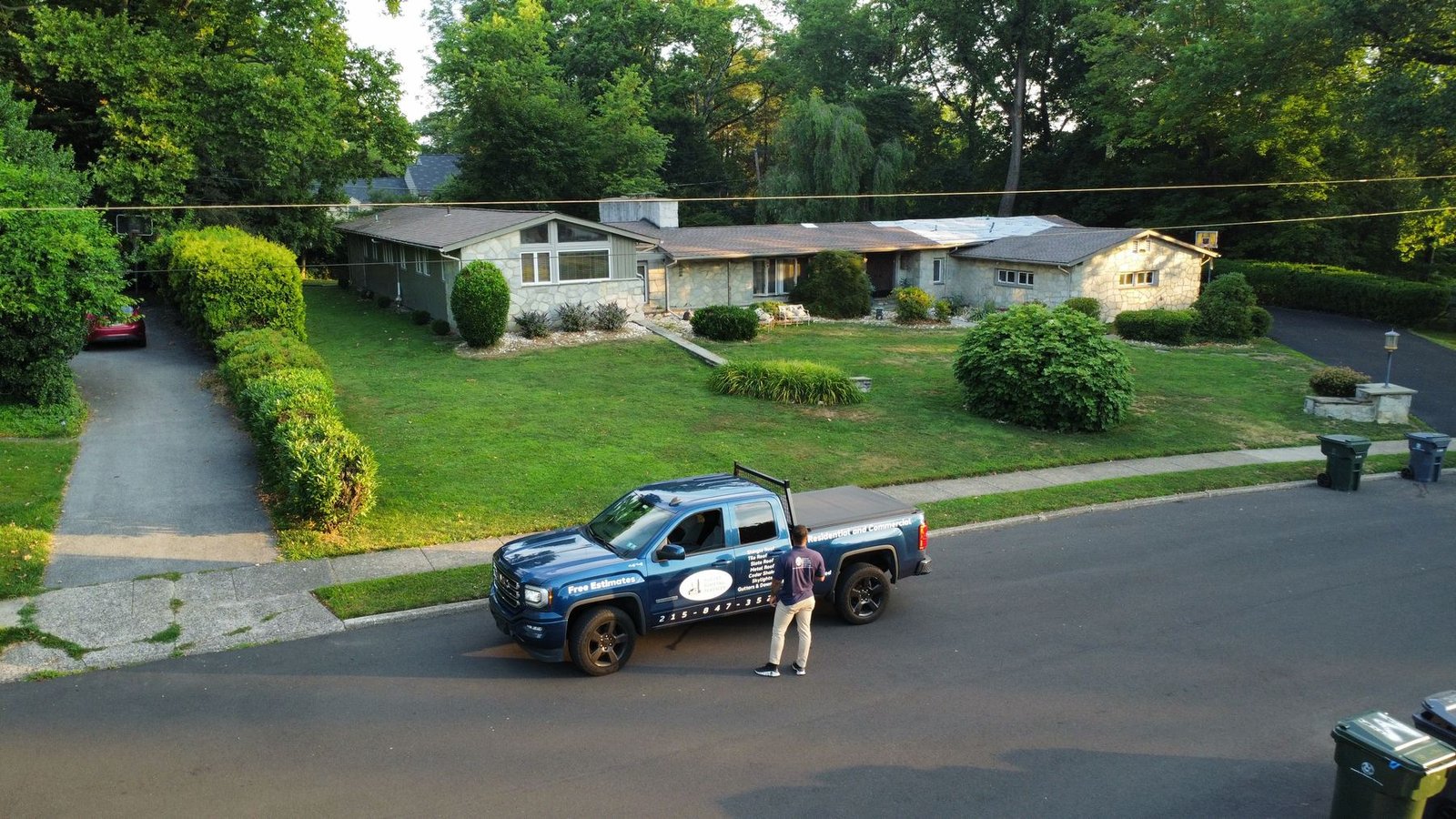 Before — Shelby Roofing truck at stone ranch with emergency tarps, PA