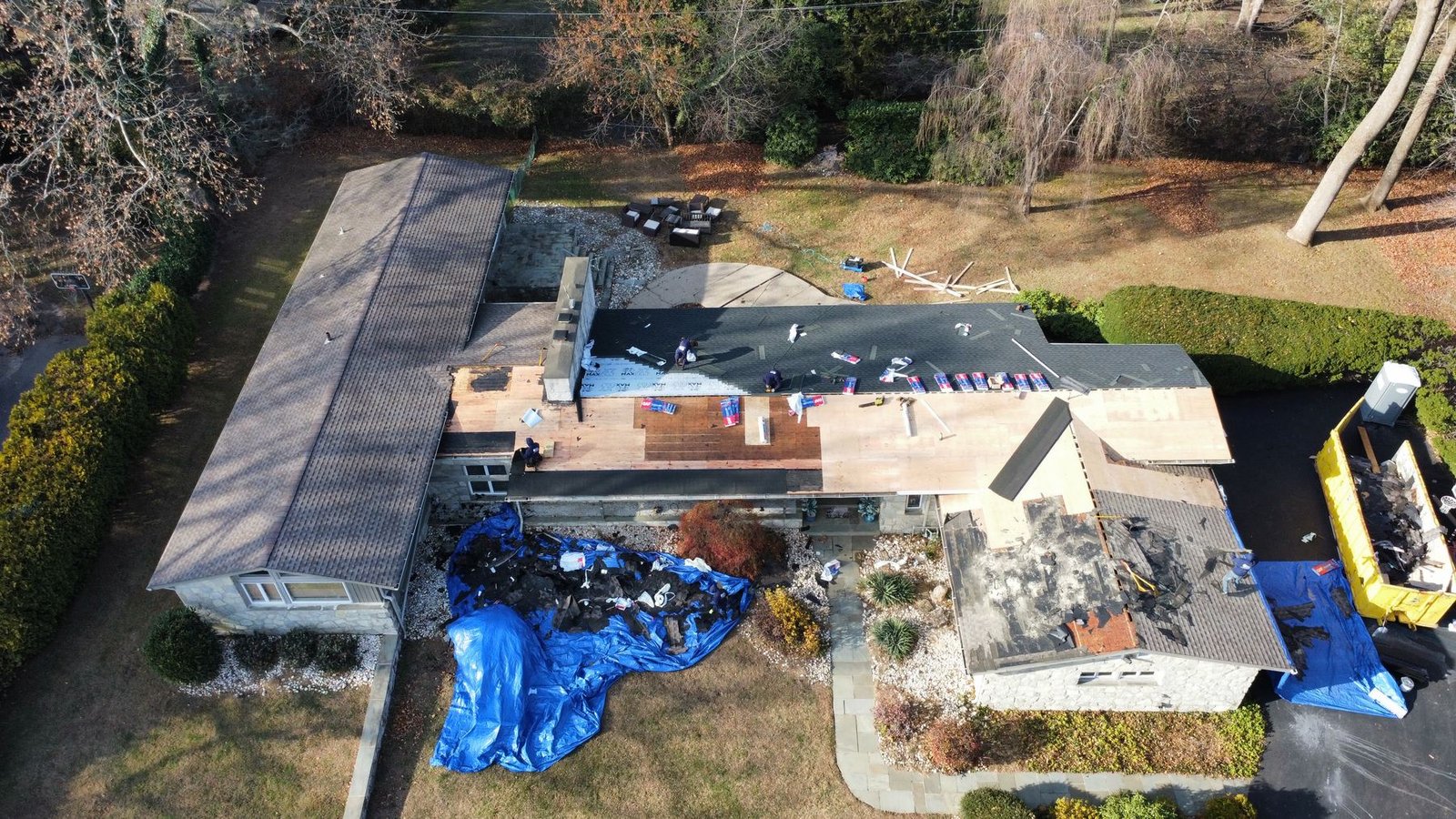 In-progress — crew installing new shingles, PA