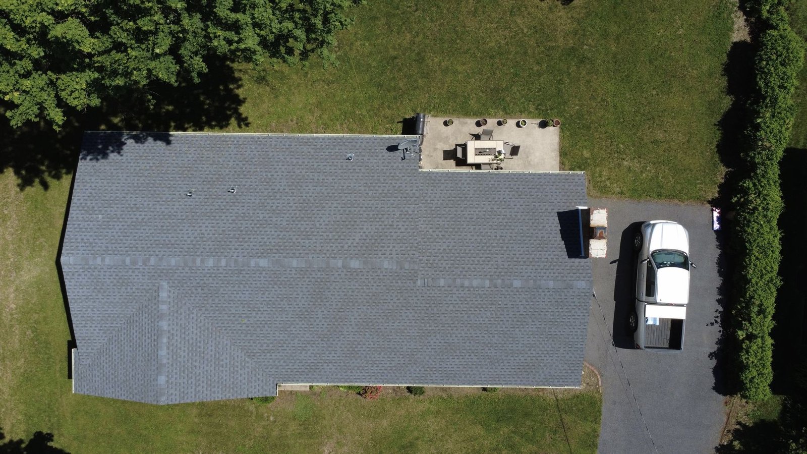 After — top-down aerial of completed ranch home shingle replacement — Shelby Roofing Services PA
