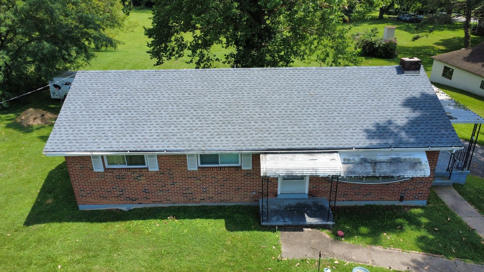 After — aerial view of completed brick ranch — Shelby Roofing Services PA