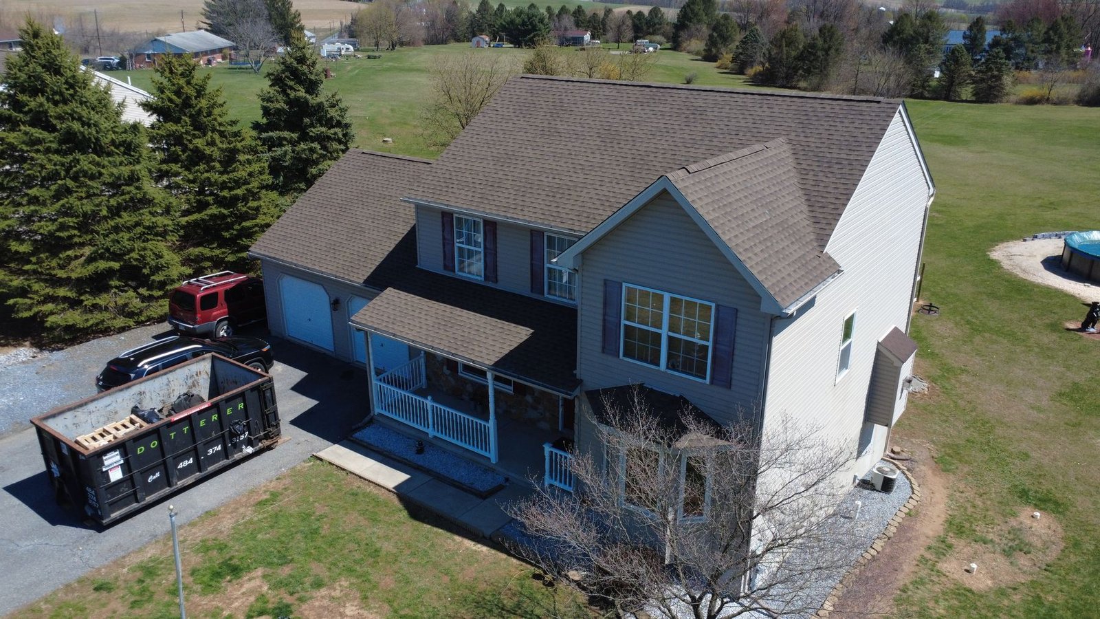 After — side aerial of completed 2-story colonial — Shelby Roofing Services PA