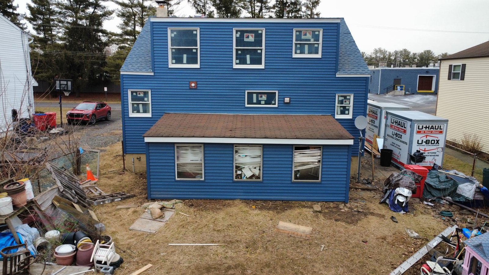 After — wide rear aerial of completed gambrel cape — Shelby Roofing Services NJ