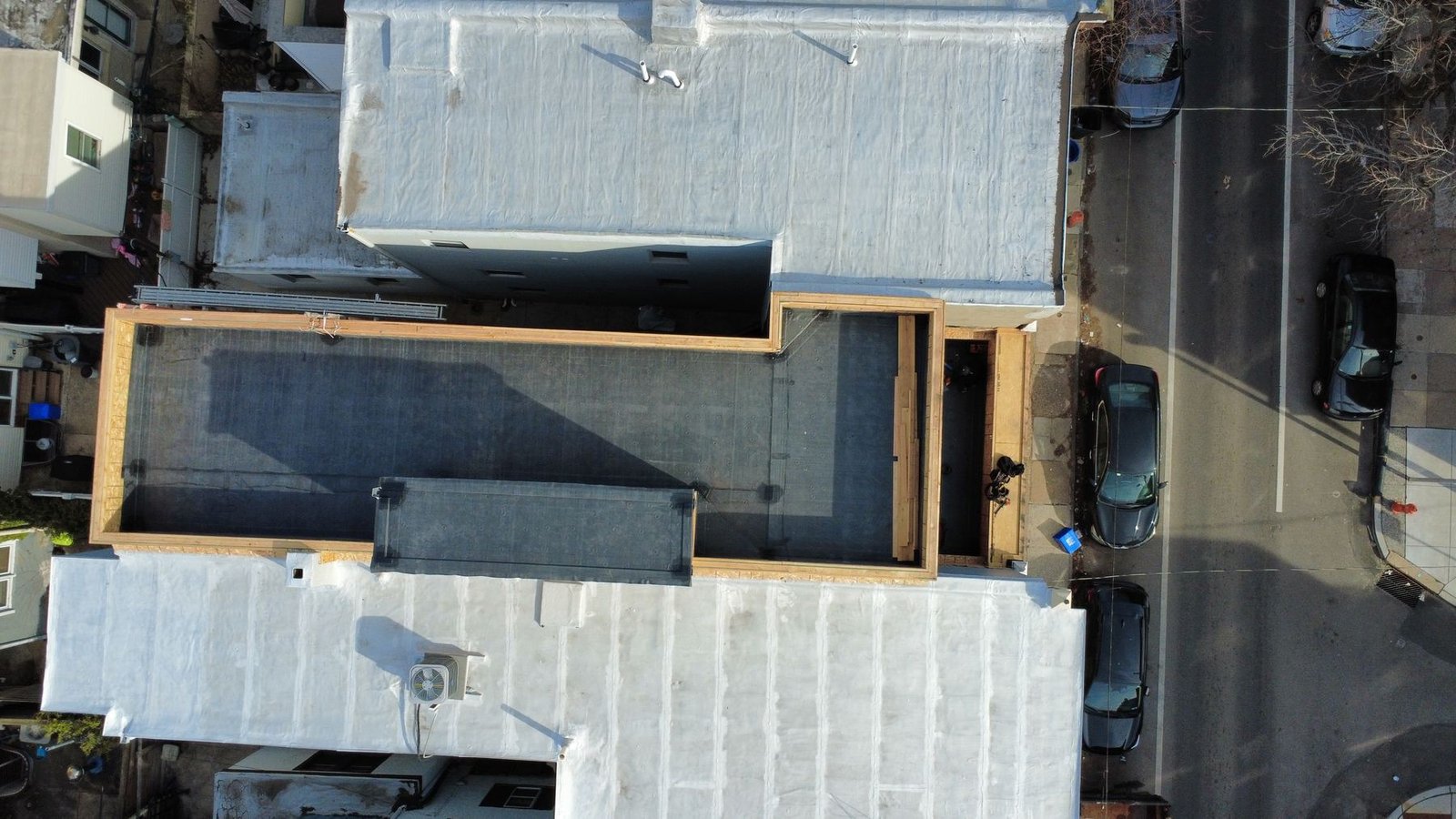 After — top-down aerial of completed commercial flat roof — Shelby Roofing Services NJ