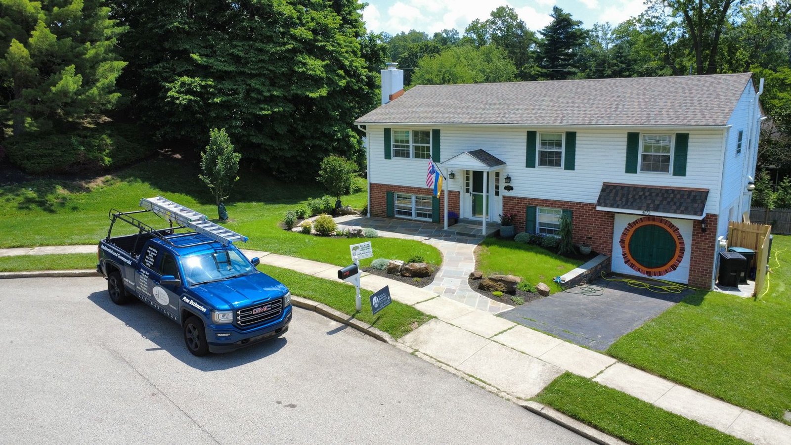 After — wide aerial of completed split-level — Shelby Roofing Services PA