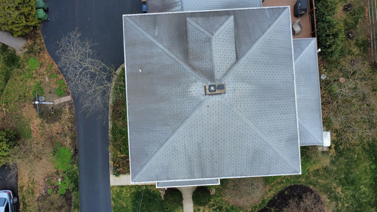 Before — aerial of blue colonial with old shingles prior to replacement, PA