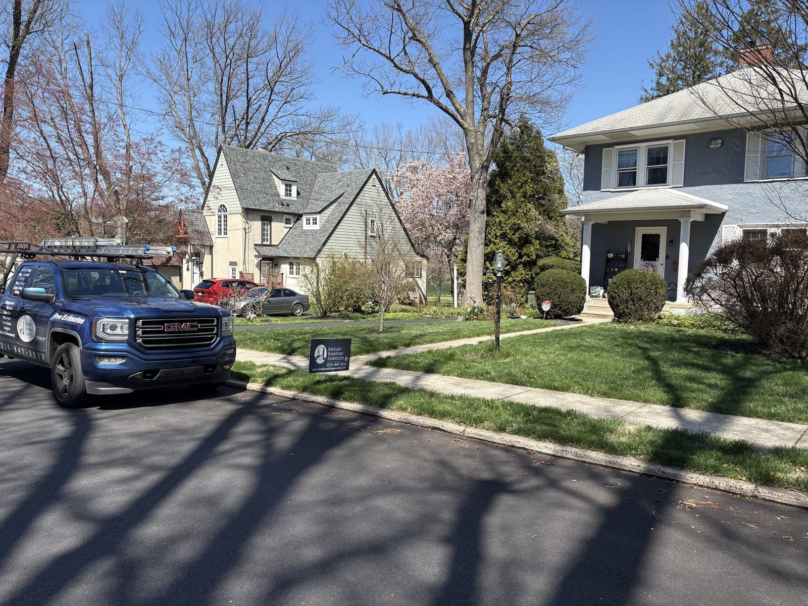Before — street-level view of colonial with Shelby truck, PA
