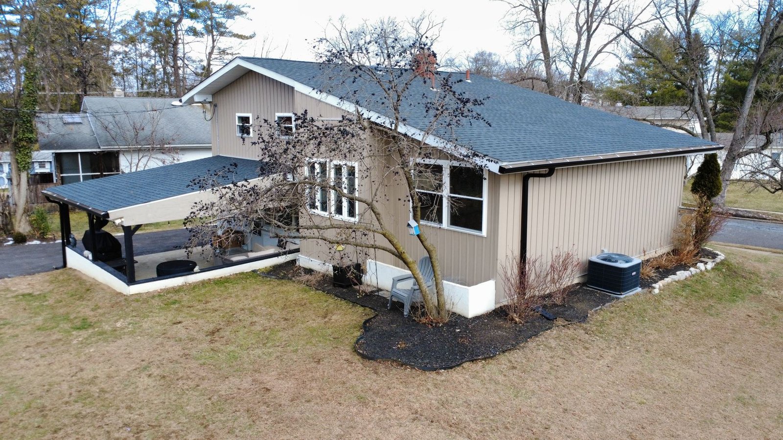 After — aerial of completed ranch home with new gray shingles — Shelby Roofing Services PA