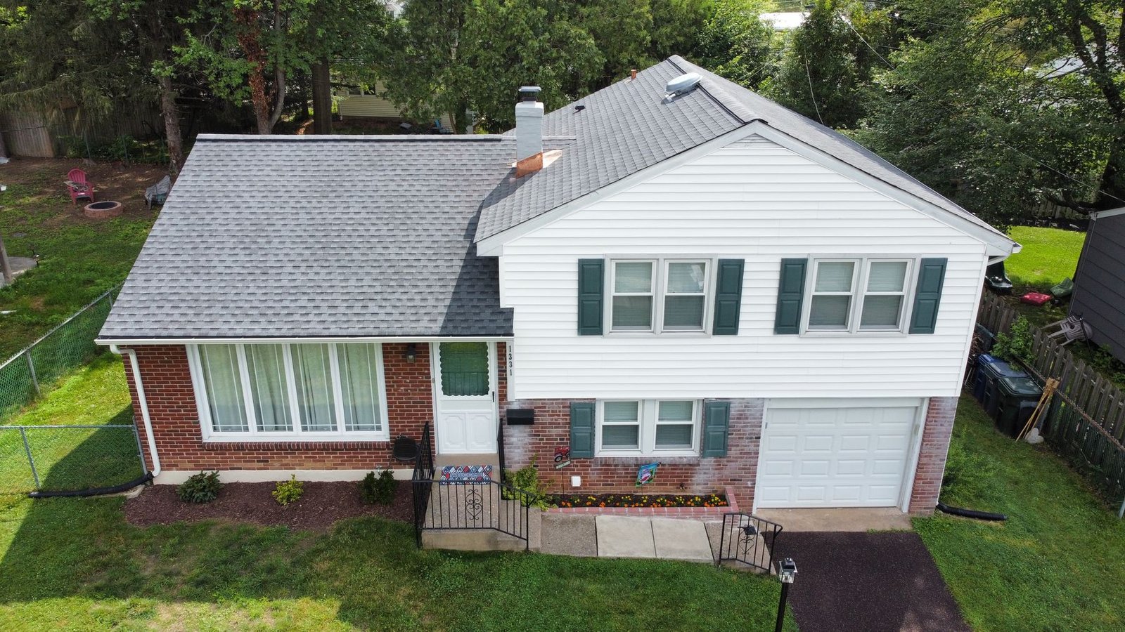 After — front-right aerial view of completed charcoal shingle replacement — Shelby Roofing Services PA