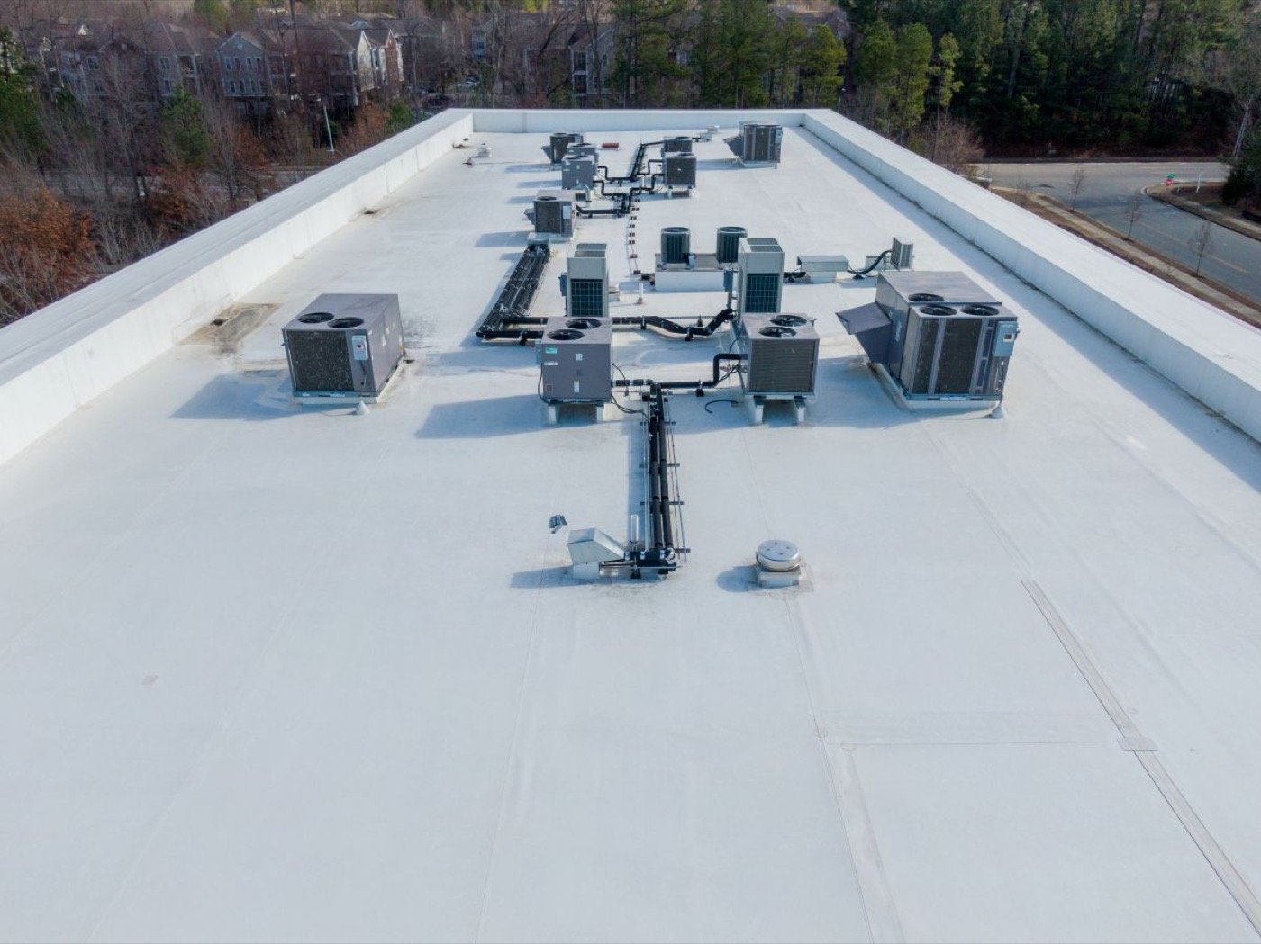 TPO single-ply membrane flat roofing system installation — Shelby Roofing Services
